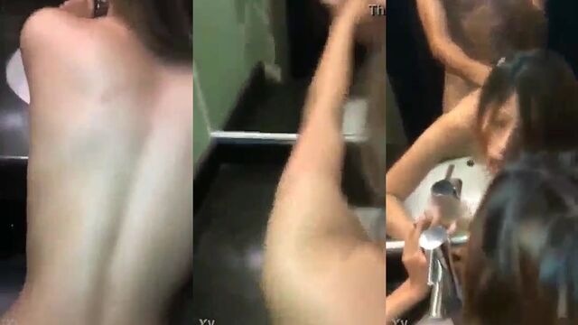 A sexy brunette has fun in the bathroom after a wild party