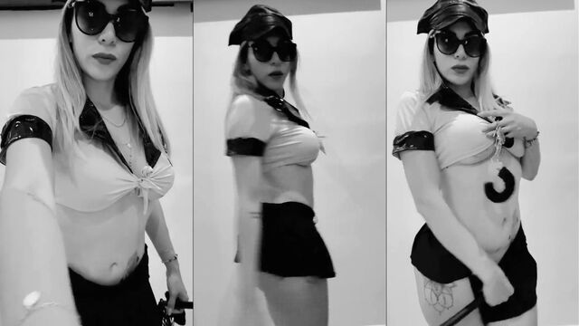 A hot cop has sex with a beautiful MILF in this steamy scene