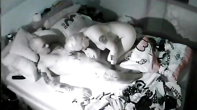 A young blonde couple unaware they are being filmed with an IP cam