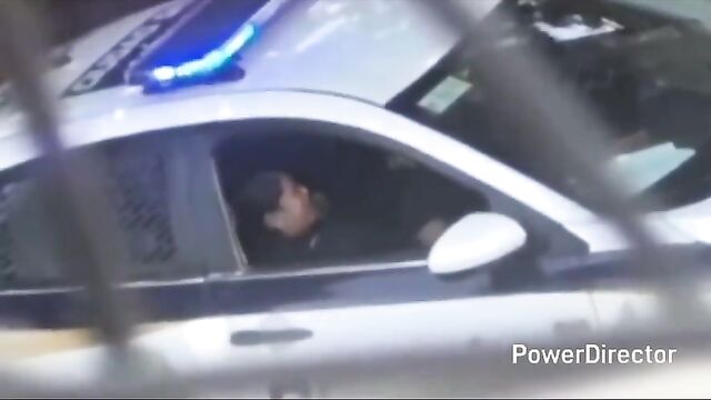 Spy cop catches girl fingering in her car, issues a ticket