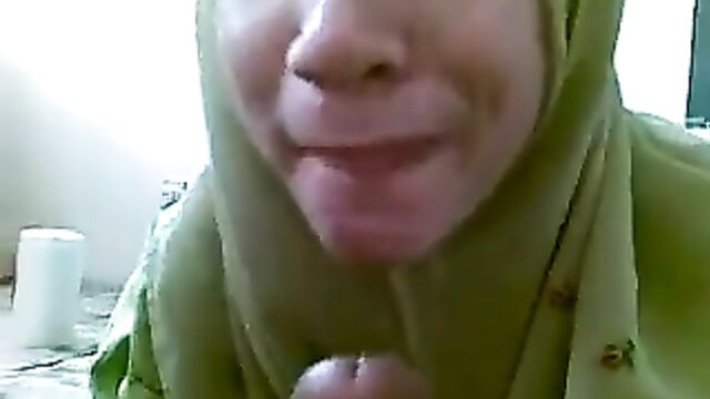 Hijabi Beauty Rims Her Man’s Cock with Her Big Tongue After Foreplay