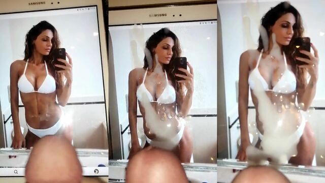 Italian girl Anna Tantangelo shows off big tits while wearing a bikini