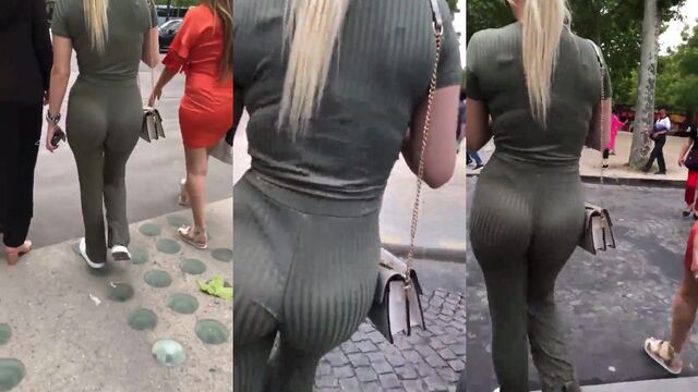 Candid shot of a big ass in black leggings while shopping
