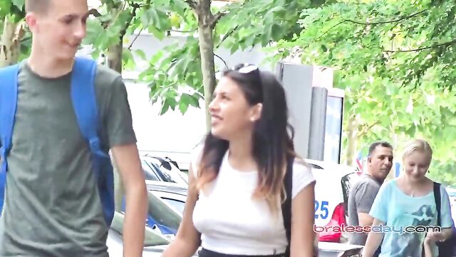 A beautiful day out in the park with no bra and see-through shirt