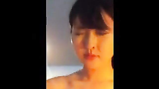 Hot Japanese teen takes a shower and finger her hairy cunt