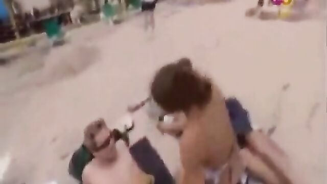 Topless European girls enjoy the sun on their bouncing boobs in UK