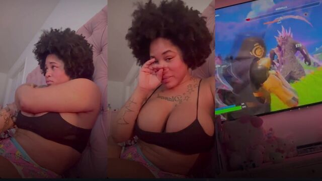 Bimbo showgirl with huge fake boobs and ass shaking