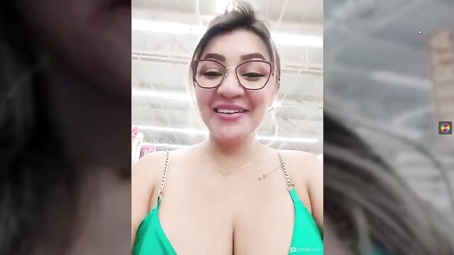 Busty brunette flashes her huge boobs in public space
