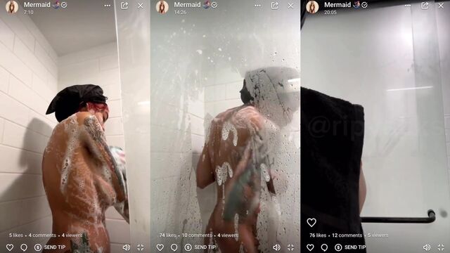 Hot ebony girl takes shower and caresses her boobs