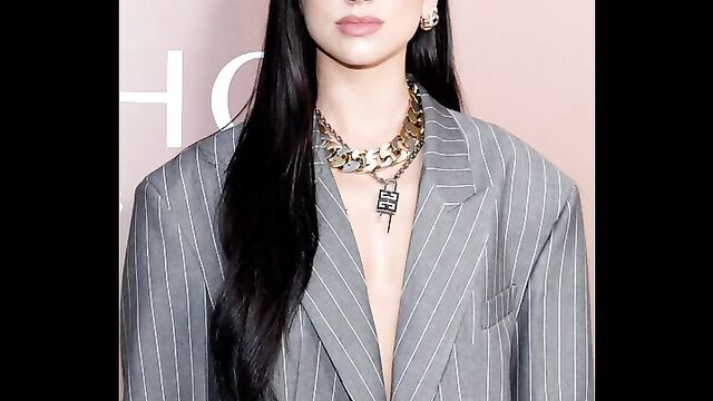 Red carpet treatment with a sexy singer in a pinstripe suit