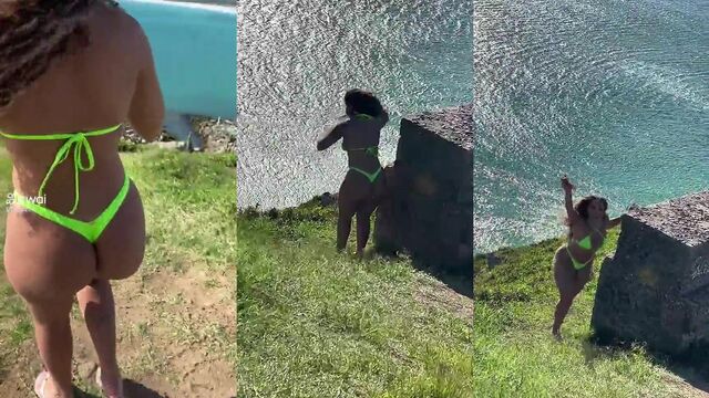 Brazilian teen shows her thong in a sensual pose