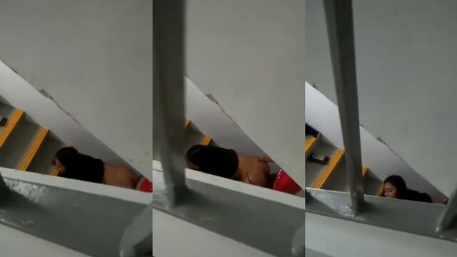 A couple has sex right on the stairs of a building
