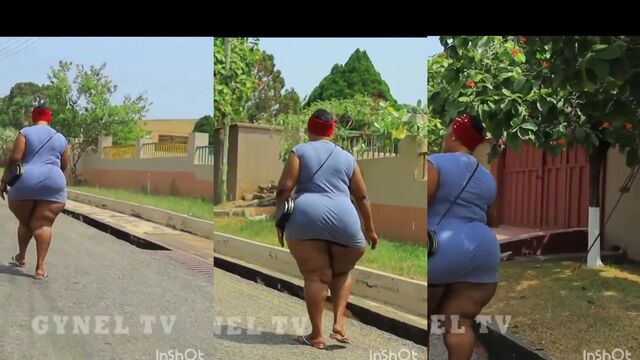 Candid shot of megabutt African beauty walking on the street