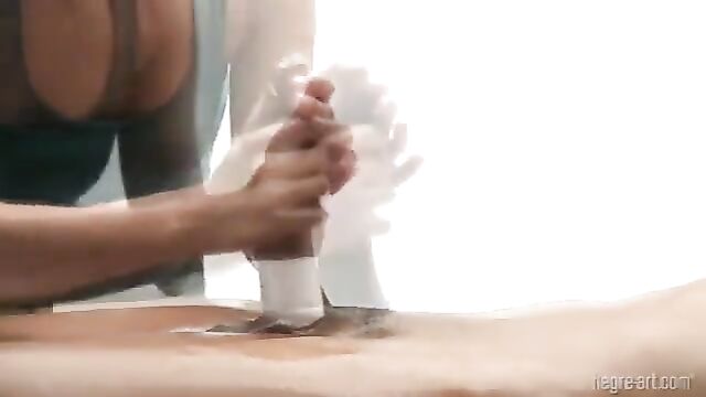 Brunette woman Zana Hegre gets her pussy painted with gold