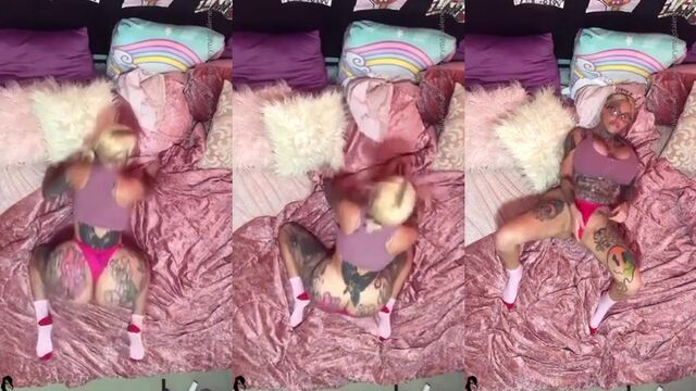 Bimbo with huge fake tits struggles in tight white top