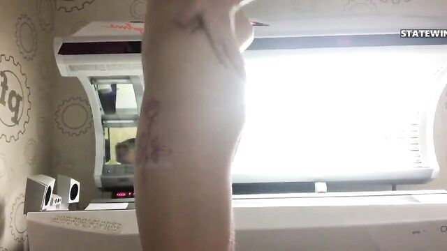 Tanning bed fun before getting naked at the gym
