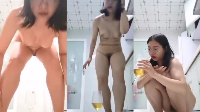 Asian teen drinks pee from a cup and gets horny