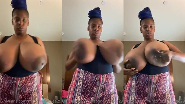 Big tits Latina with huge areolas smokes and shakes in the kitchen