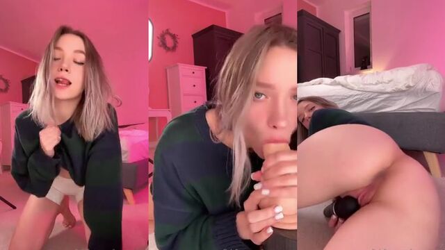 The Asian camgirl masturbates her pussy on the bed with a pillow