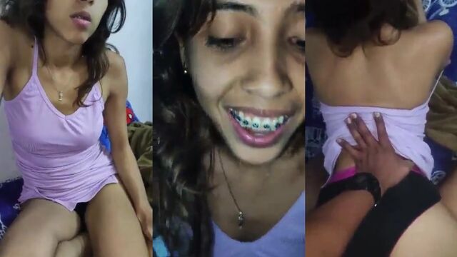 Pretty teen reflects on the mirror while her boyfriend cumms on her clothes