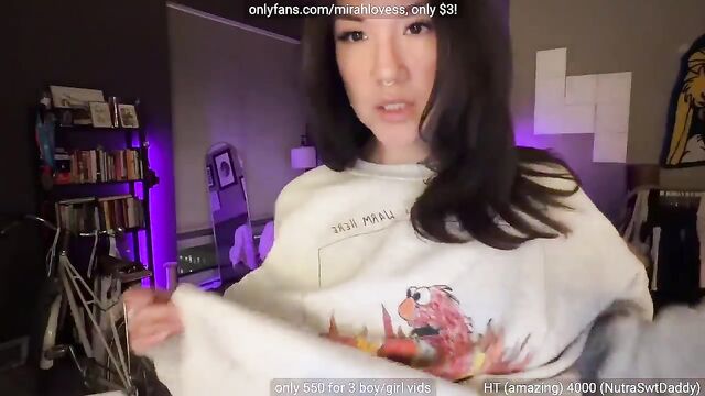 A cute petite Asian girl shows her skills in teasing