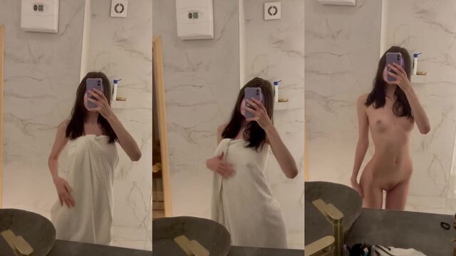Skinny Asian teen plays with her pussy using a dildo