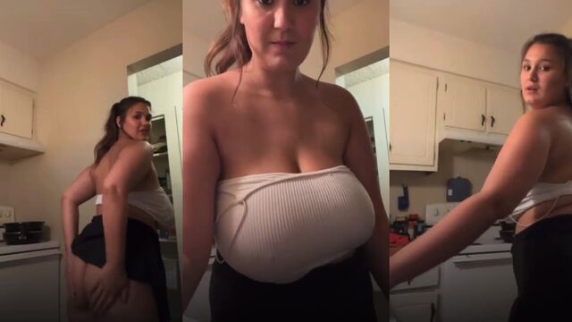 Busty blonde flashes her huge boobs in the middle of the street