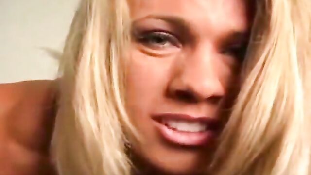 Female Bodybuilder Melissa Dettwiller Flexes Her Hard-Muscled Biceps