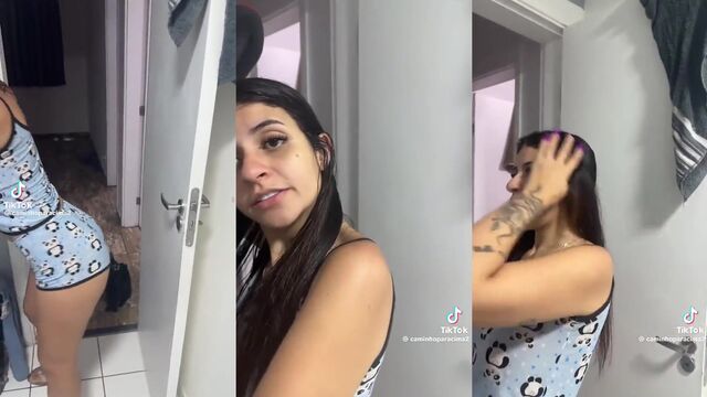A cute woman shows her ass and pussy in a transparent shortie pajama