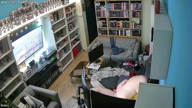 A couple has a living room sex session, getting caught on IP cam