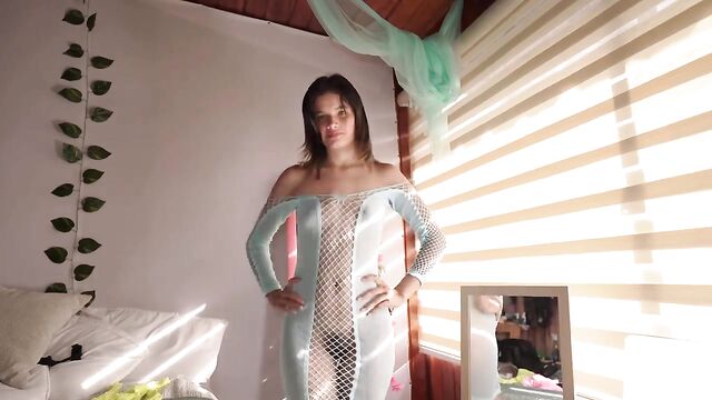 Hot girl in transparent clothes, cleaning the house with passion