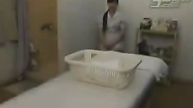 Asian masseuse gives erotic massage to lesbian couple
