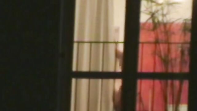 A hidden camera captured a stunning girl getting naked and indulging in some intimate fun