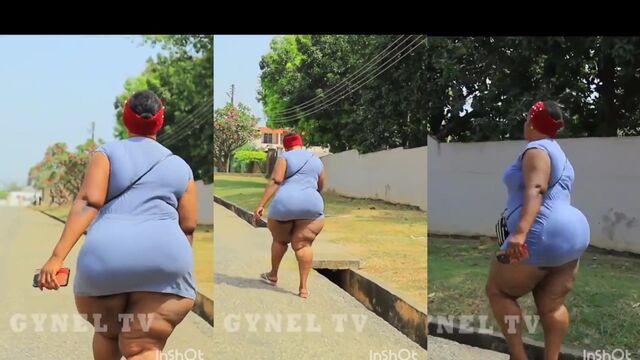 Candid shot of megabutt African beauty walking on the street with huge ass