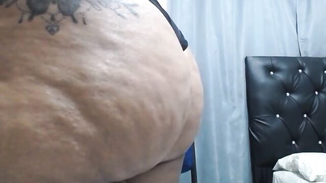 The fat Colombian mom shakes her big ass in thong underwear