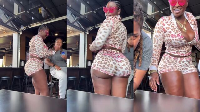 Ebony babe Jenise Hart shows off her big ass in public clapping