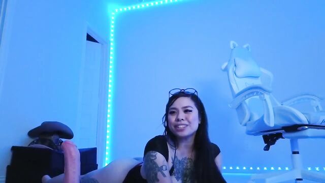 Petite Asian beauty gives foot job and hand job