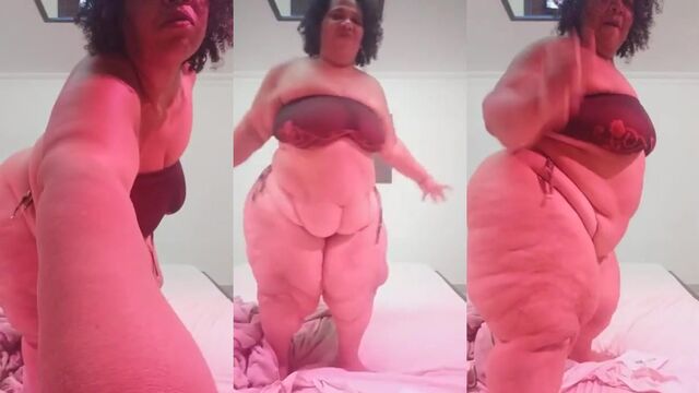Fat granny shows off her giant ass and gets fingered in the bathroom
