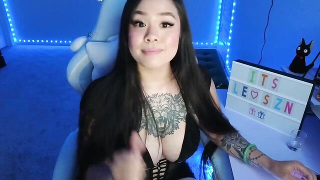 Petite Asian beauty gives a foot job and hand job before getting naked