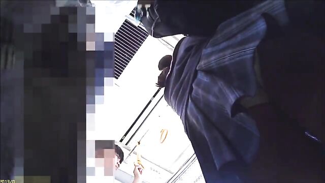 A hidden camera caught a hot girl lifting her skirt on the street