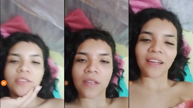 A young and beautiful girl performing on a live camera show