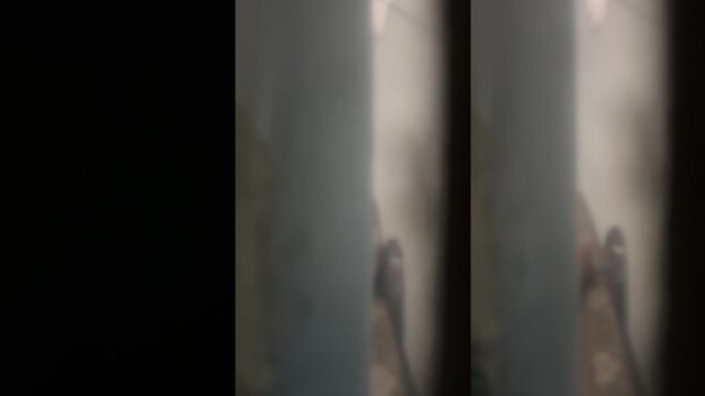 Tia safada moaning loudly in the bedroom, a scene of intense passion