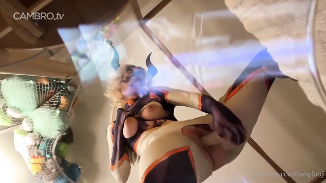 The cute girl masturbates with a dildo and reaches a powerful orgasm