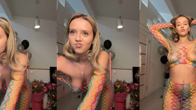 A beautiful blonde with huge boobs plays with her pussy on cam