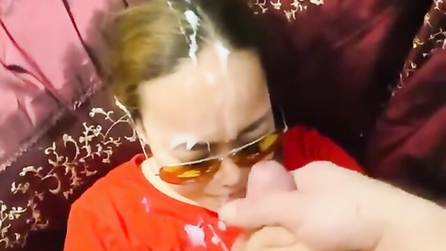 Asian maid gets her face covered with cum in a hot scene