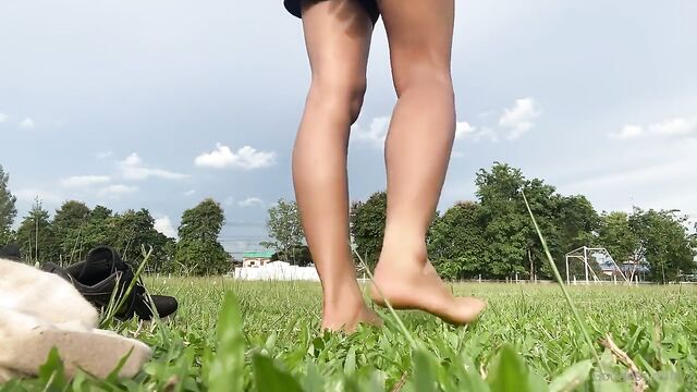 Sweaty Thai girl licks and teases with her stinky soles