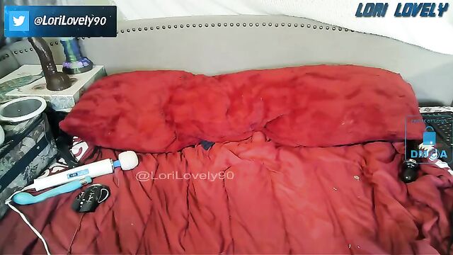A fat woman plays with a rubber toy and fucks herself