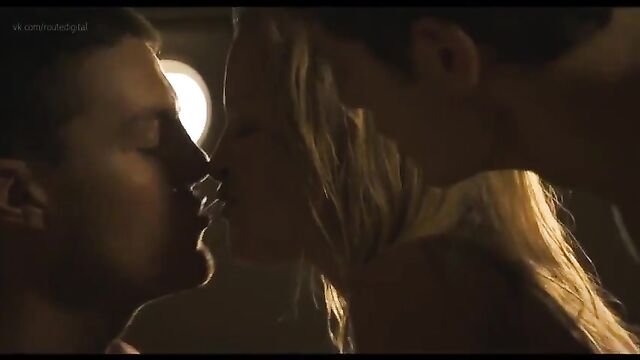 Giving a blowjob to two guys in front of the camera