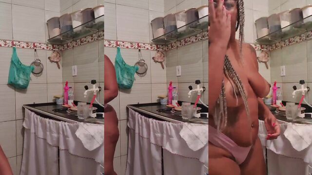 Juicy black woman shows her ass on the window to the neighbors