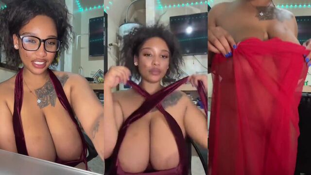A thick girl caresses her boobs and pussy in sexy underwear